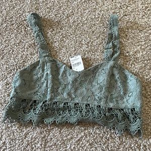 NWT: Tilly’s teal cropped bra top size medium cute texture and adjustable straps